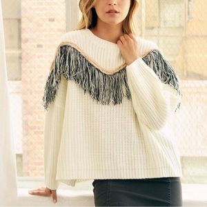 Cream-colored fringe sweater